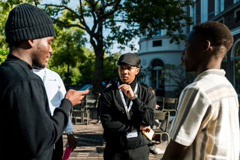 Iviwe talking with other participants outdoors