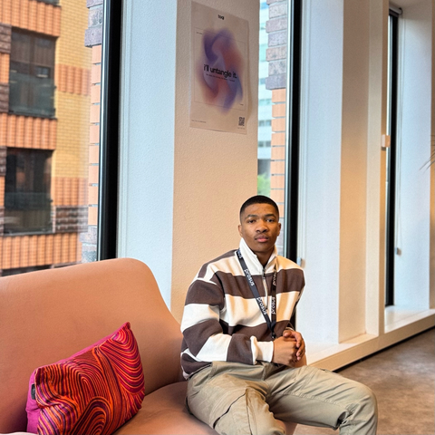 Iviwe Booi seated in a lounge at Prosus